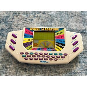 Vintage Tiger Electronics Handheld Wheel of Fortune Game